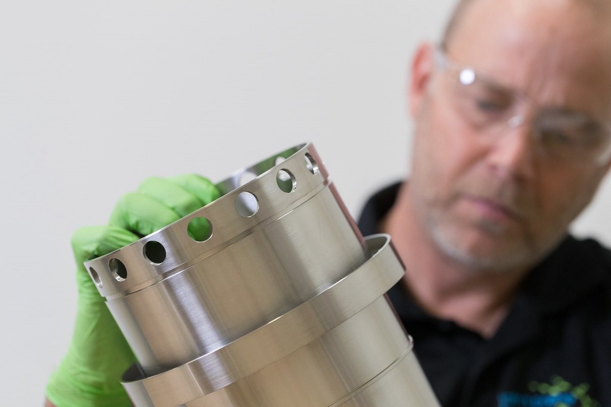 Employee examining mechanical seal