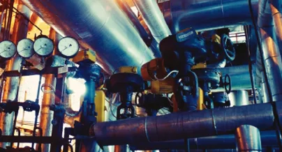 Industrial pipes and valves in a factory