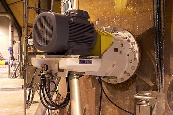 A large electric motor on a wall