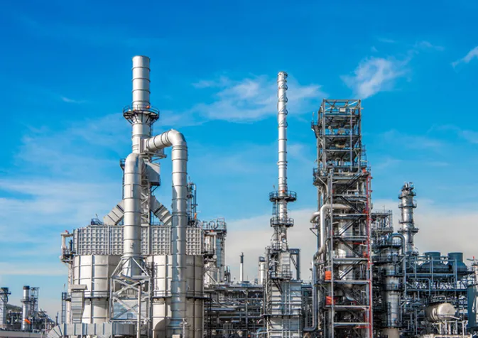 A large industrial refinery with pipes