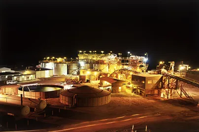 A large industrial plant at night
