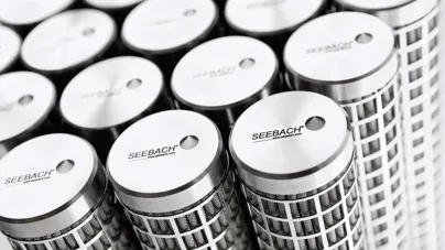 Several metal cylinders with the word Seebach on them