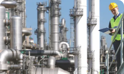 Man Infront Of Factory