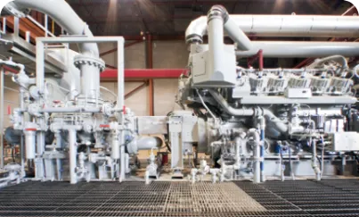 A large industrial machine with pipes and valves